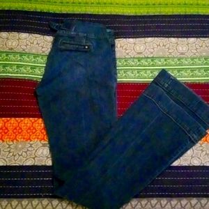 Lucky Brand trouser style jeans with flares and button detailing on pockets.